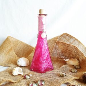 La mélodie des sirènes rose potion décorative l'atelier des mystères vue de dos