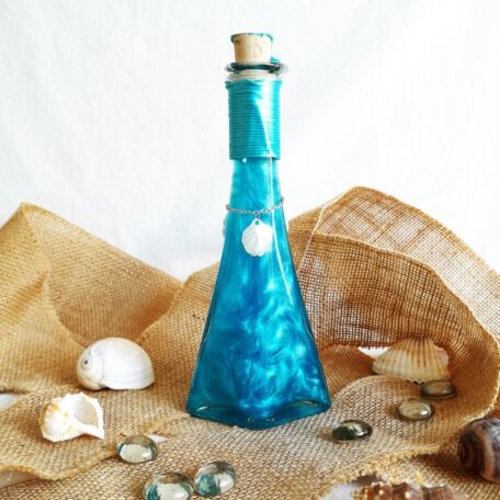 La mélodie des sirènes bleue potion décorative l'atelier des mystères vue de dos